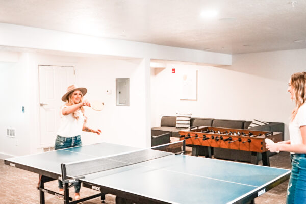 Apartment community clubhouse with ping pong & foosball